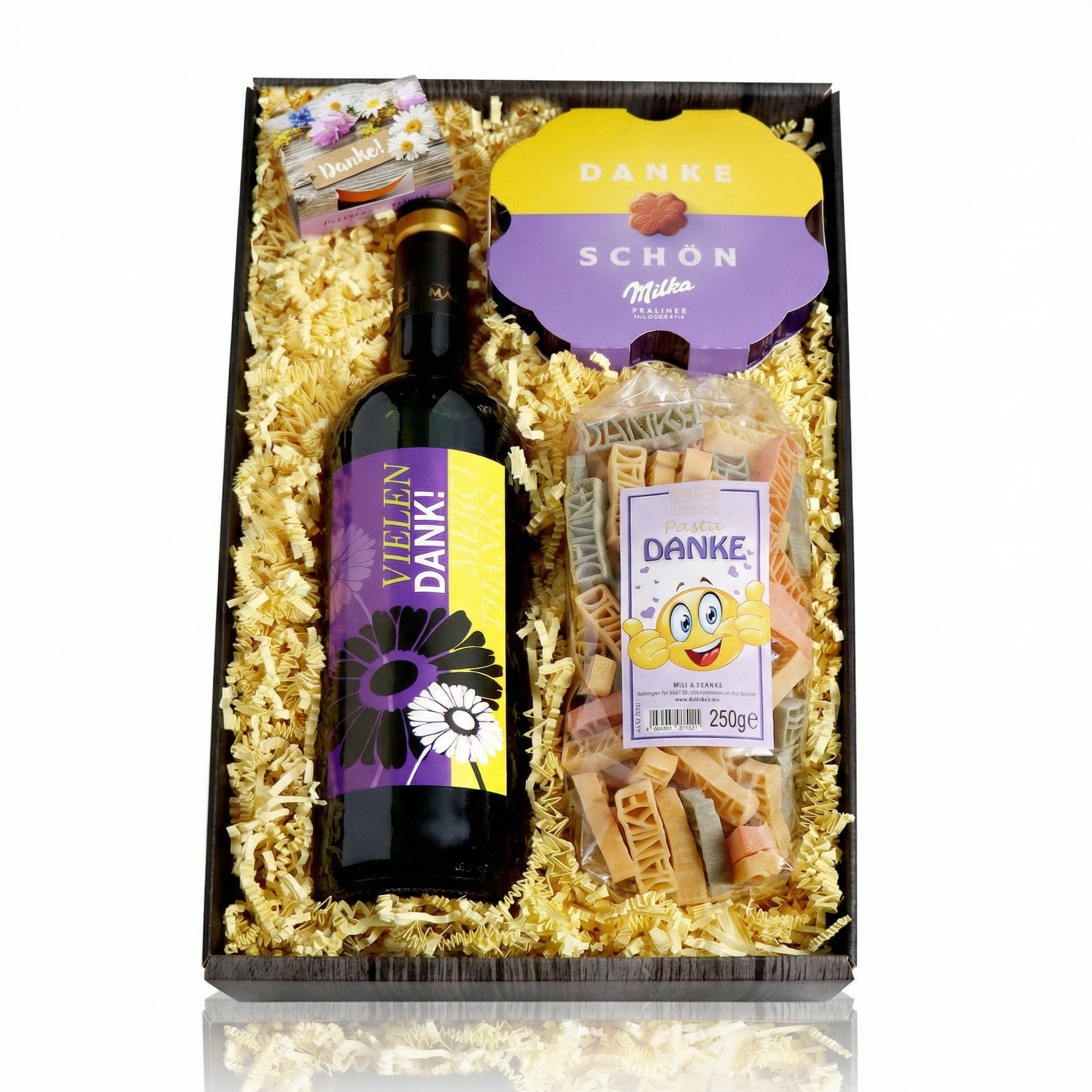 Geschenkskorb mit Wein, Milka schokolade, minipflanzenset, motivnudel mit danke - im Danke Design